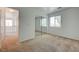 Bedroom with sliding closet doors and neutral carpeting at 7249 Linaria Rd, Las Vegas, NV 89113