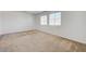 Bright bedroom with two windows and neutral carpet at 7249 Linaria Rd, Las Vegas, NV 89113