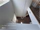 High angle view of the foyer showcasing natural light and view of staircase at 7249 Linaria Rd, Las Vegas, NV 89113