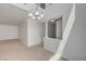 Spacious living room with high ceilings, neutral carpet, and ample natural light at 7249 Linaria Rd, Las Vegas, NV 89113