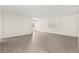 Large living room with light wood flooring and a ceiling fan at 7566 Glowing Ember Ct # 101, Las Vegas, NV 89130