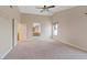 Primary bedroom with high ceilings and ensuite bath at 7711 Lofty Hill Ct, Las Vegas, NV 89123
