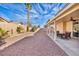 Large backyard with a covered patio area and ample space for outdoor entertaining at 7886 Palace Monaco Ave, Las Vegas, NV 89117