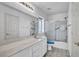 Bathroom boasts shower-tub combination, well-lit vanity with bright lights, and tiled floors at 7886 Palace Monaco Ave, Las Vegas, NV 89117