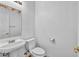 Powder room with pedestal sink and decorative wall accents at 7886 Palace Monaco Ave, Las Vegas, NV 89117