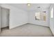 Bright bedroom featuring a large window for natural light and a closet providing plenty of storage space at 7886 Palace Monaco Ave, Las Vegas, NV 89117