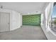 Bright bedroom with ample natural light and decorative accent wall at 7886 Palace Monaco Ave, Las Vegas, NV 89117