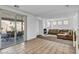 Open-concept living space with fireplace and seamless indoor-outdoor flow at 7886 Palace Monaco Ave, Las Vegas, NV 89117