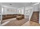Comfortable living room featuring plush sectional sofa and neutral tones at 7886 Palace Monaco Ave, Las Vegas, NV 89117