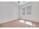 Bedroom featuring carpet, neutral paint, and plenty of natural light at 7908 Morning Gallop Ct, Las Vegas, NV 89131