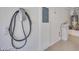 Garage with water filtration system and electric vehicle charger at 7908 Morning Gallop Ct, Las Vegas, NV 89131