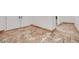 Hallway features stone tile flooring and leads to doorways for multiple rooms at 7908 Morning Gallop Ct, Las Vegas, NV 89131