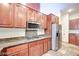 Gourmet kitchen features stainless steel appliances, stone countertops, and plenty of cabinet space at 7908 Morning Gallop Ct, Las Vegas, NV 89131