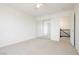 Bright bedroom featuring carpet and closet with sliding mirrored doors at 8224 Cassis Ct, Las Vegas, NV 89117