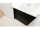 Laundry room has sink and vanity with dark cabinets and white countertops at 8224 Cassis Ct, Las Vegas, NV 89117