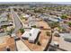 Aerial view of home with desert landscaping and fenced yard surrounded by similar homes at 829 Dover Pl, Las Vegas, NV 89107