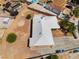 Aerial view of home, desert landscaping and fenced yard at 829 Dover Pl, Las Vegas, NV 89107