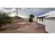 Backyard featuring gravel, a bush, and a view of the home at 829 Dover Pl, Las Vegas, NV 89107