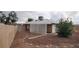 Backyard featuring gravel and a lattice shade at 829 Dover Pl, Las Vegas, NV 89107