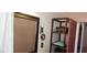 Bright bathroom featuring shelving for storage, and a decorative mirror for added style and comfort at 829 Dover Pl, Las Vegas, NV 89107
