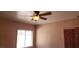 Bedroom with window and ceiling fan at 829 Dover Pl, Las Vegas, NV 89107