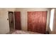 Bedroom features closet doors and tile flooring at 829 Dover Pl, Las Vegas, NV 89107