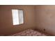 Bedroom with a window providing natural light at 829 Dover Pl, Las Vegas, NV 89107
