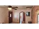 Inviting entryway featuring a charming door and arched doorways, showcasing the character of the home at 829 Dover Pl, Las Vegas, NV 89107