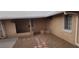 Exterior view of desert-landscaped entryway with a walkway of stepping stones and muted exterior paint at 829 Dover Pl, Las Vegas, NV 89107