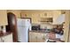 Traditional kitchen with classic cabinets, stainless steel appliances, and ample counter space for meal preparation at 829 Dover Pl, Las Vegas, NV 89107