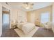 Cozy bedroom with neutral tones, including a comfortable bed and serene ambiance at 830 Carnegie St # 824, Henderson, NV 89052