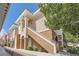 An exterior view of the home's side entrance with stairs leading to the units at 830 Carnegie St # 824, Henderson, NV 89052