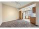Open layout shows kitchen, dining and carpeted living space at 830 Carnegie St # 824, Henderson, NV 89052