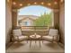 Cozy patio area with comfortable seating and a view of the community at 830 Carnegie St # 824, Henderson, NV 89052