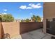 Backyard features brick wall and concrete patio at 8336 Golden Amber St, Las Vegas, NV 89139