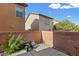 A walled backyard patio shows an area for bikes and outdoor recreation equipment at 8336 Golden Amber St, Las Vegas, NV 89139