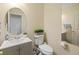 Compact half bathroom featuring a modern vanity, a toilet, and decorative accents at 8336 Golden Amber St, Las Vegas, NV 89139