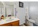 Bathroom with white sink and toilet at 8336 Golden Amber St, Las Vegas, NV 89139