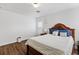 Bedroom featuring neutral walls, natural light and hardwood floors at 8336 Golden Amber St, Las Vegas, NV 89139