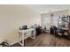 Home office with hardwood floors and windows that provide natural light at 8336 Golden Amber St, Las Vegas, NV 89139