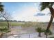 Palm trees in a backyard over looking a golf course at 9 Knob Oak Dr, Henderson, NV 89052