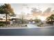 Beautiful single-story home featuring desert landscaping and a long driveway at 9 Knob Oak Dr, Henderson, NV 89052
