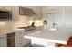 Bright, well-appointed kitchen with marble countertops and stainless steel appliances at 9 Knob Oak Dr, Henderson, NV 89052