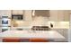 Bright, well-appointed kitchen with marble countertops and stainless steel appliances at 9 Knob Oak Dr, Henderson, NV 89052