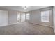 Large carpeted bedroom featuring natural light, with ensuite bathroom access at 9005 Semillon St, Las Vegas, NV 89148