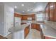 Spacious kitchen with modern island, ample countertop space, and white appliances at 9005 Semillon St, Las Vegas, NV 89148