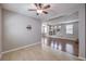 Comfortable room with wood floors that connects to living room featuring modern fireplace and decor at 9005 Semillon St, Las Vegas, NV 89148