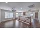 Bright loft area with wood floors, ceiling fan and stair access at 9005 Semillon St, Las Vegas, NV 89148