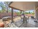 Relax on this covered patio with a hot tub and beautiful landscaping, perfect for outdoor entertaining at 9005 Semillon St, Las Vegas, NV 89148