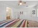 Large main bedroom features a ceiling fan, closet, and an ensuite bathroom at 9105 White Eyes Ave, Las Vegas, NV 89143